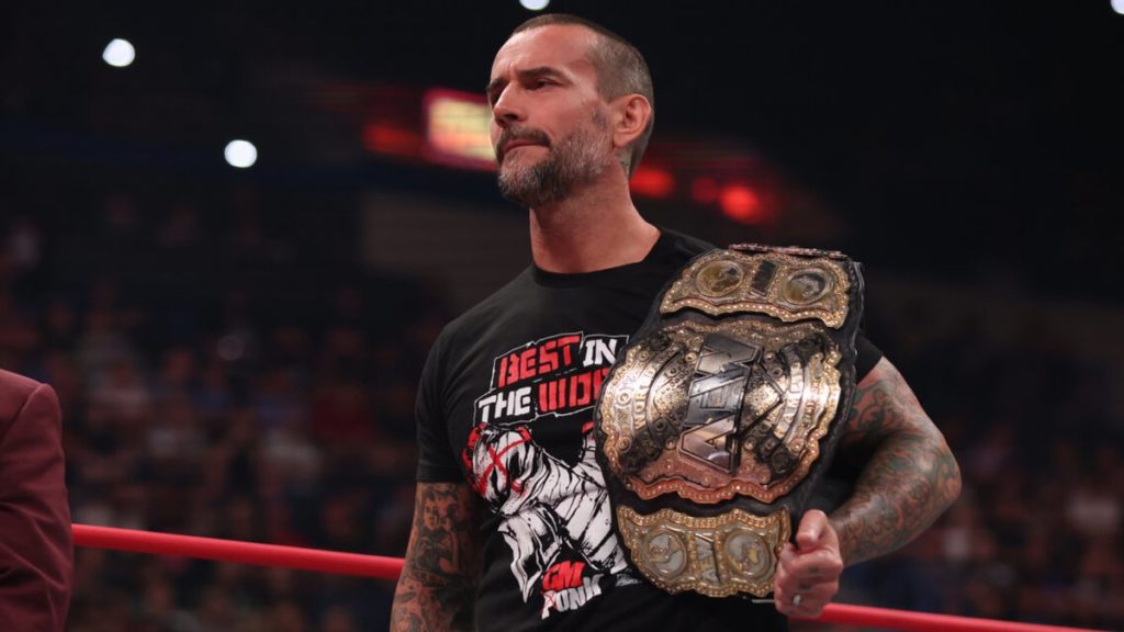 cm punk aew world title collision