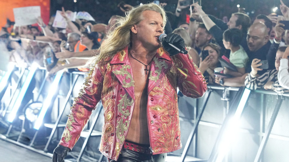 Chris Jericho signing during his entrance at AEW All In
